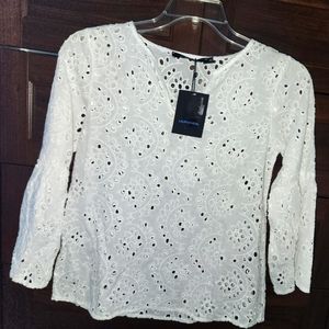 Lauren Vidal White top
